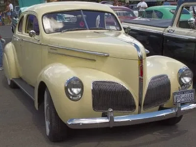 A classic car parked outside